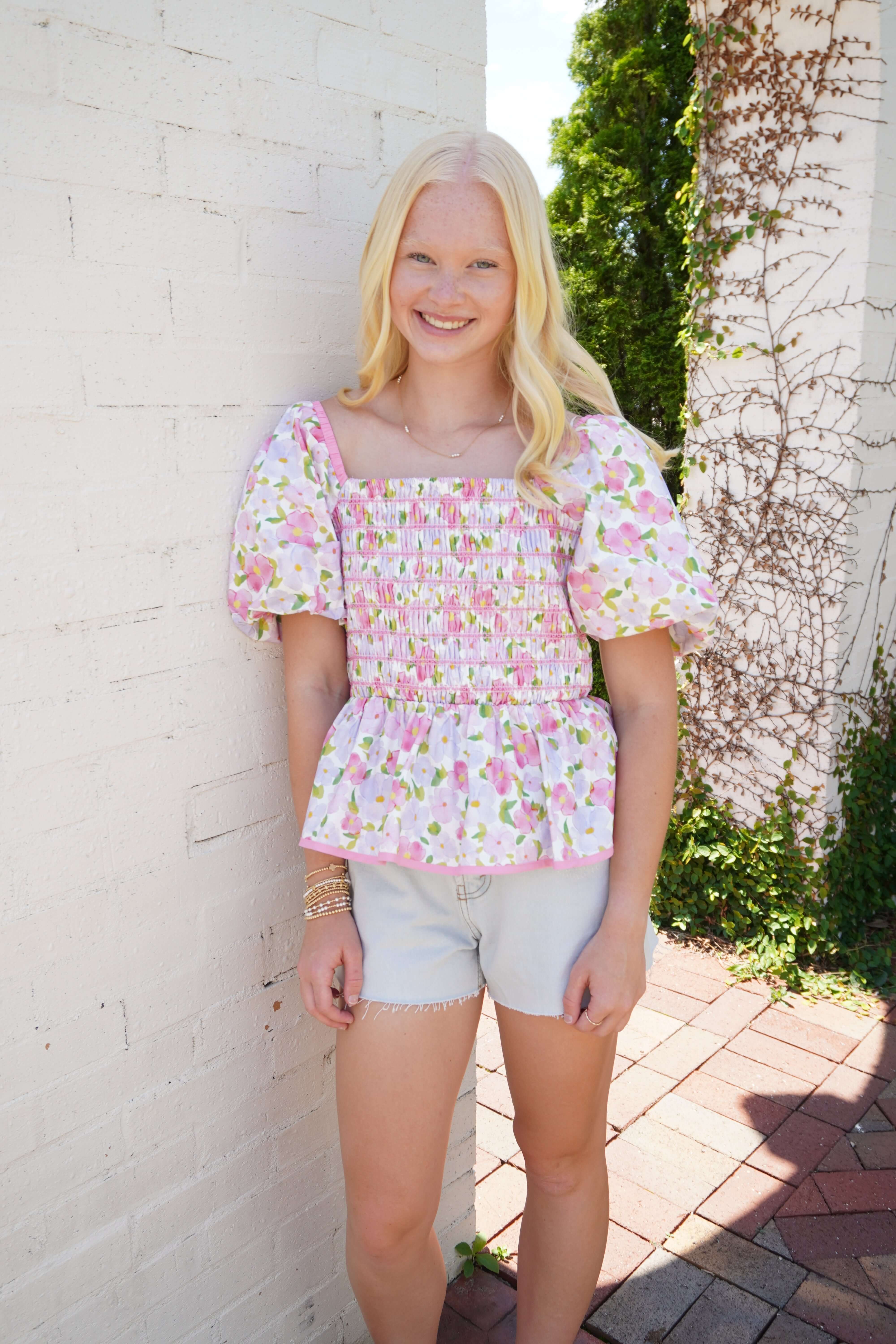 Sweet Magnolia Smocked Floral Peplum Top